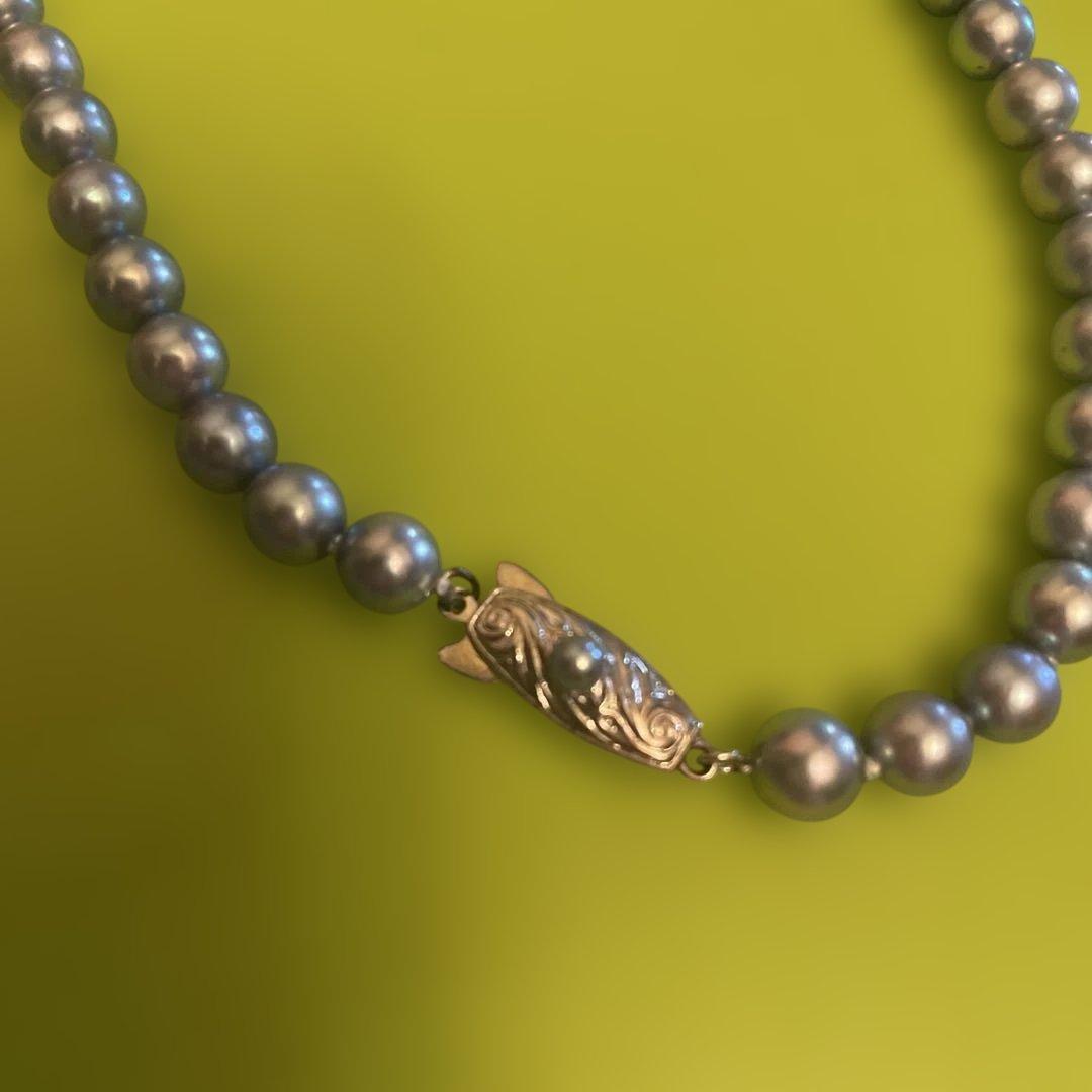 Tasaki silver pearl necklace with fish-shaped clasp, approximately 80 cm long
