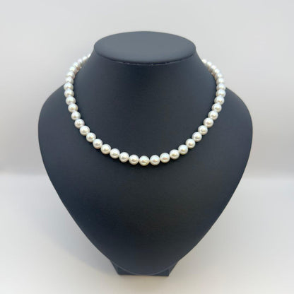 Tasaki silver gray pearl necklace with 7.6-7.8mm pearls measuring approximately 41cm in length