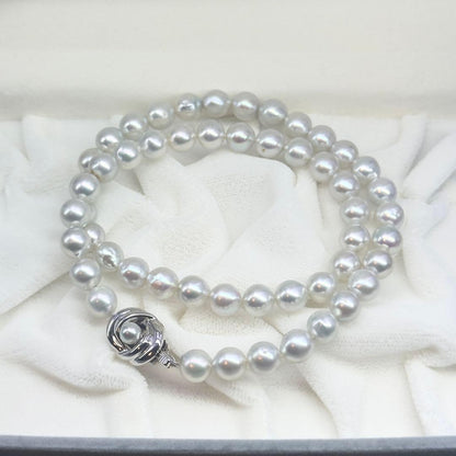Tasaki silver gray pearl necklace with 7.6-7.8mm pearls measuring approximately 41cm in length
