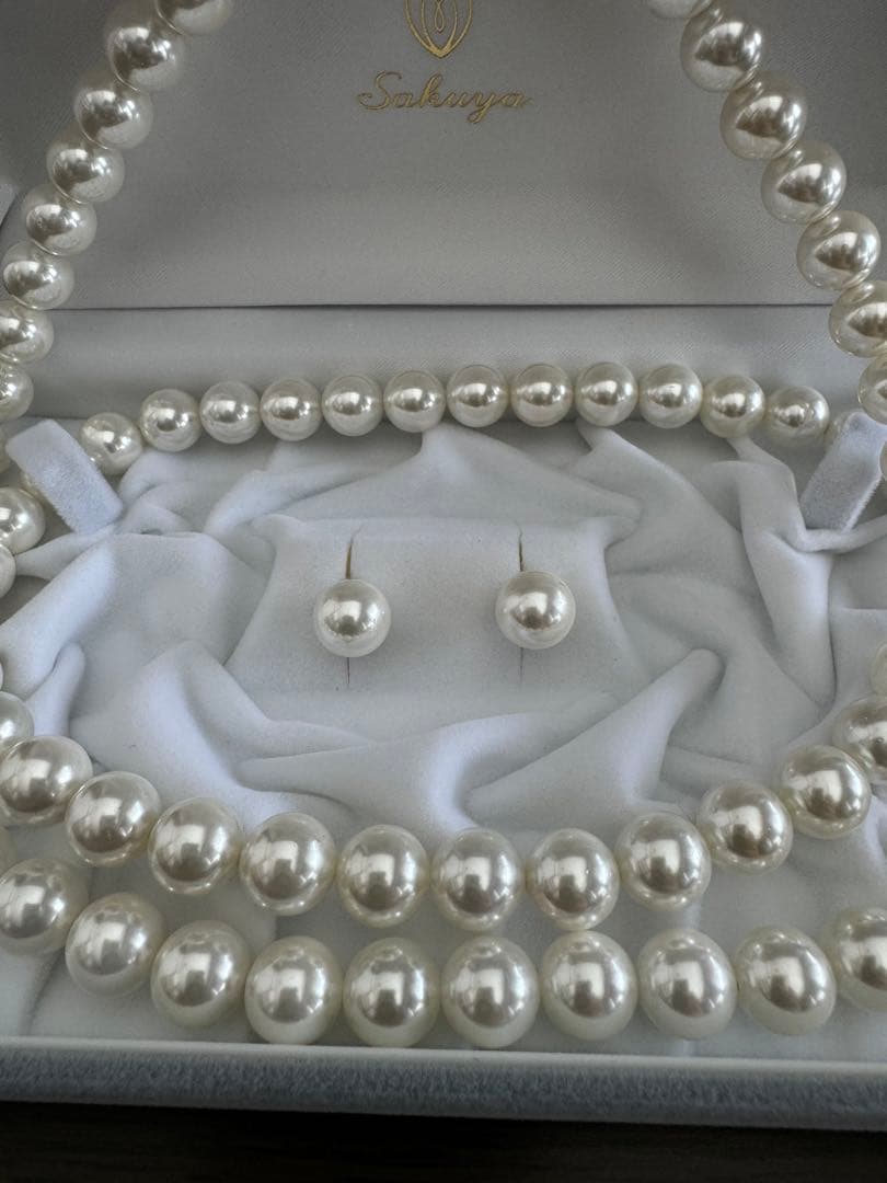 Shell pearl long necklace and matching earrings with 10mm white beads on brass rhodium plated metal