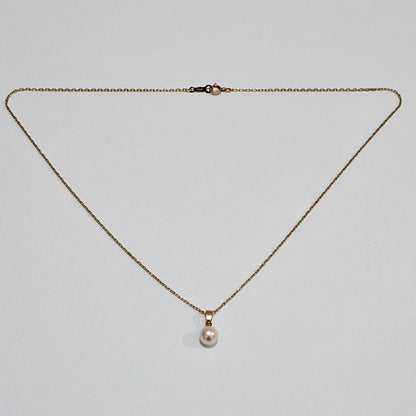 Mikimoto pearl necklace with 6.4mm pearl set in 18K yellow gold chain 40 cm long