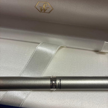 Waterman silver ballpoint pen with matte finish and chrome clip displayed with dedicated case