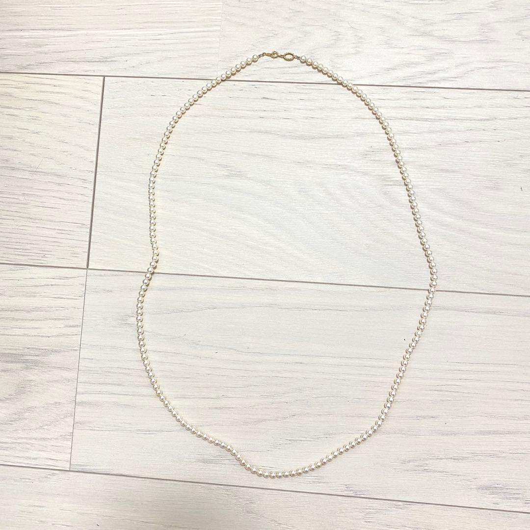 MIKIMOTO K18 gold long necklace with 5mm white pearls, 85cm length, displayed on a white background