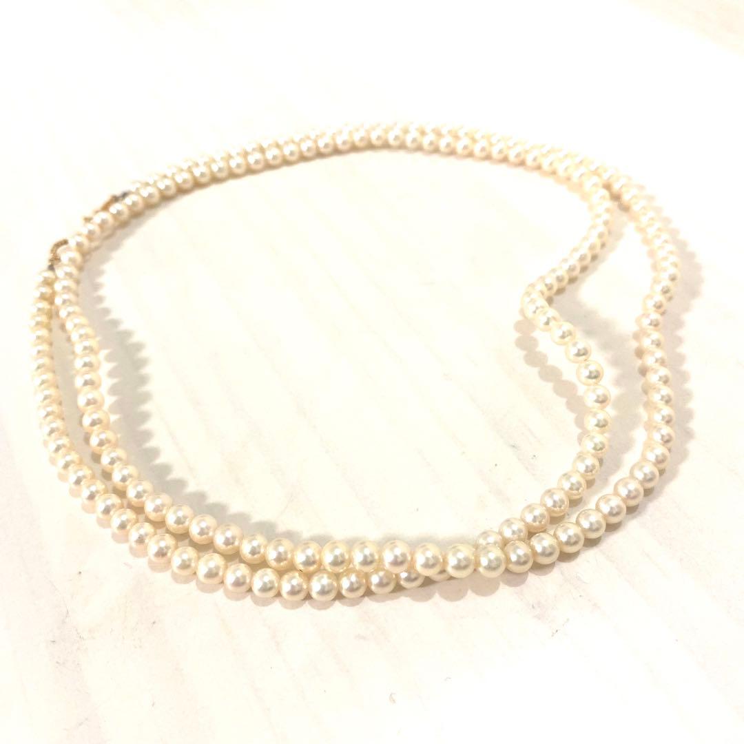 MIKIMOTO K18 gold long necklace with 5mm white pearls, 85cm length, displayed on a white background