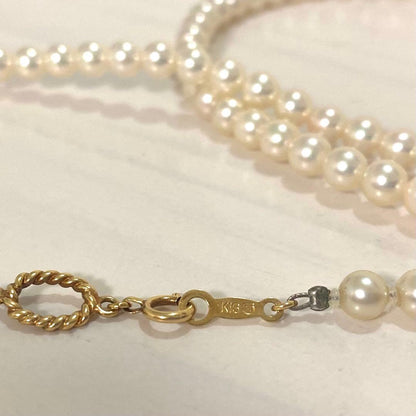 MIKIMOTO K18 gold long necklace with 5mm white pearls, 85cm length, displayed on a white background