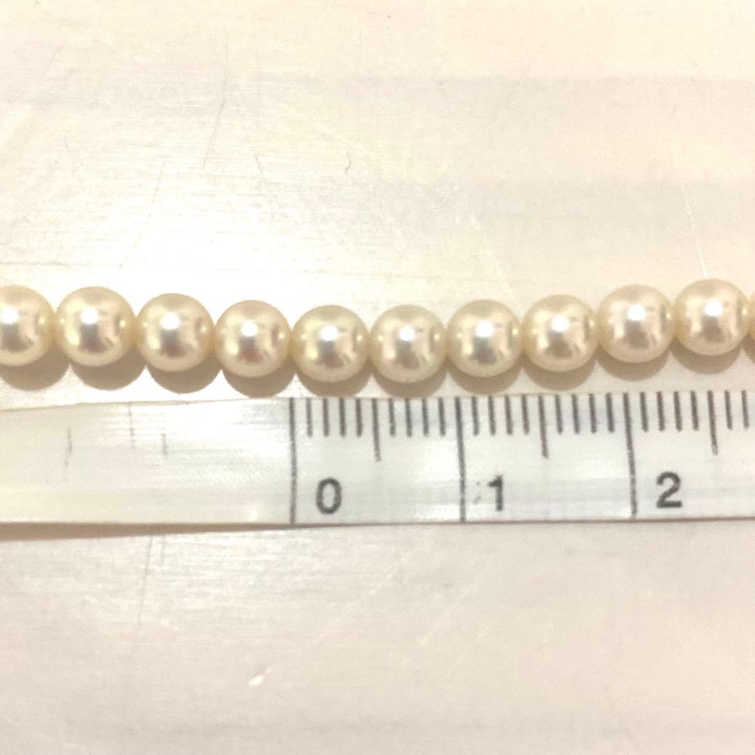 MIKIMOTO K18 gold long necklace with 5mm white pearls, 85cm length, displayed on a white background