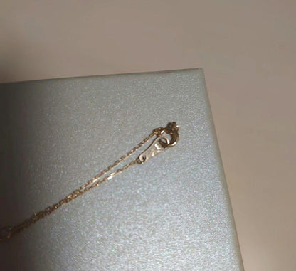 ageteK10 Turquoise Necklace made of 10k yellow gold with turquoise charm and agete brand stamp