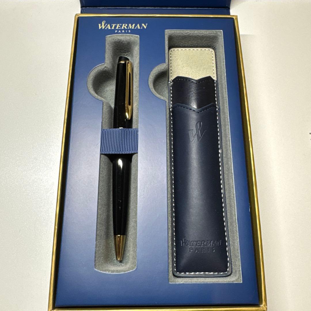Waterman ballpoint pen in black metal two-tone design with matching leather case