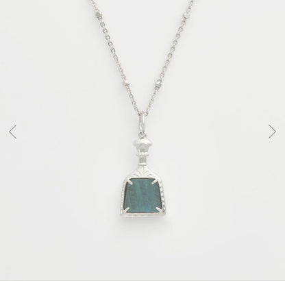 Agete necklace featuring labradorite and onyx stones with silver bottle-shaped pendant and charm