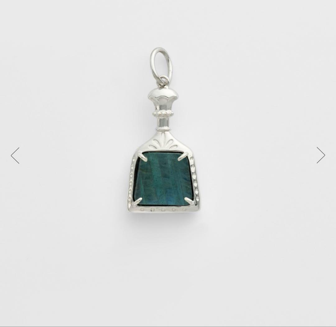 Agete necklace featuring labradorite and onyx stones with silver bottle-shaped pendant and charm