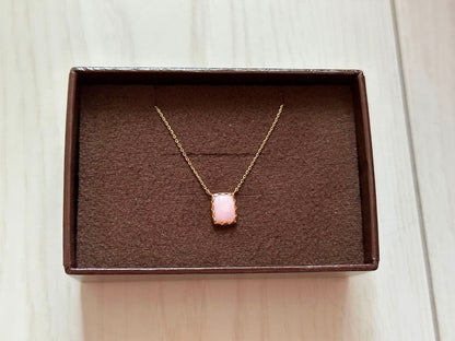 Pink K10 gold necklace featuring a delicate agate conch shell pendant
