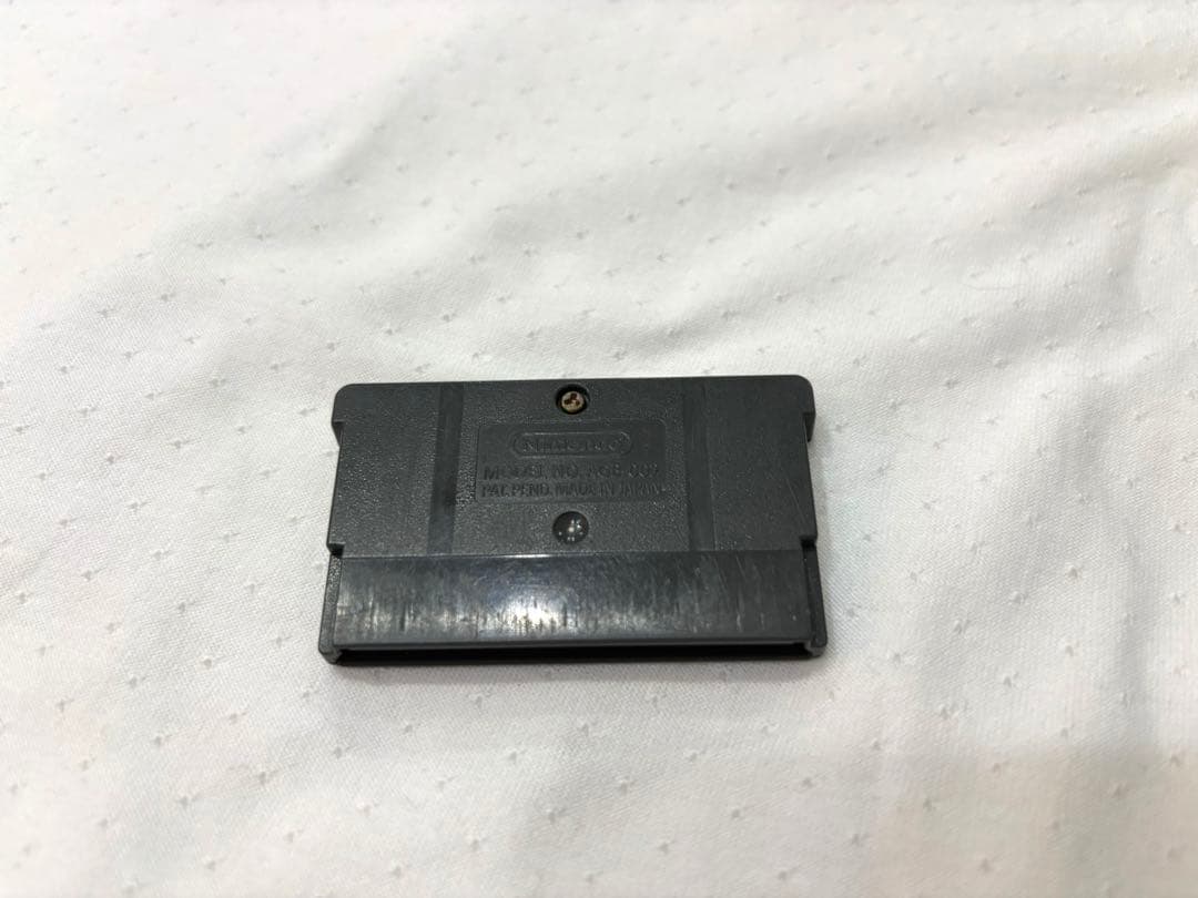 Mother 1+2 game cartridge for Game Boy Advance with original box showing wear and tears