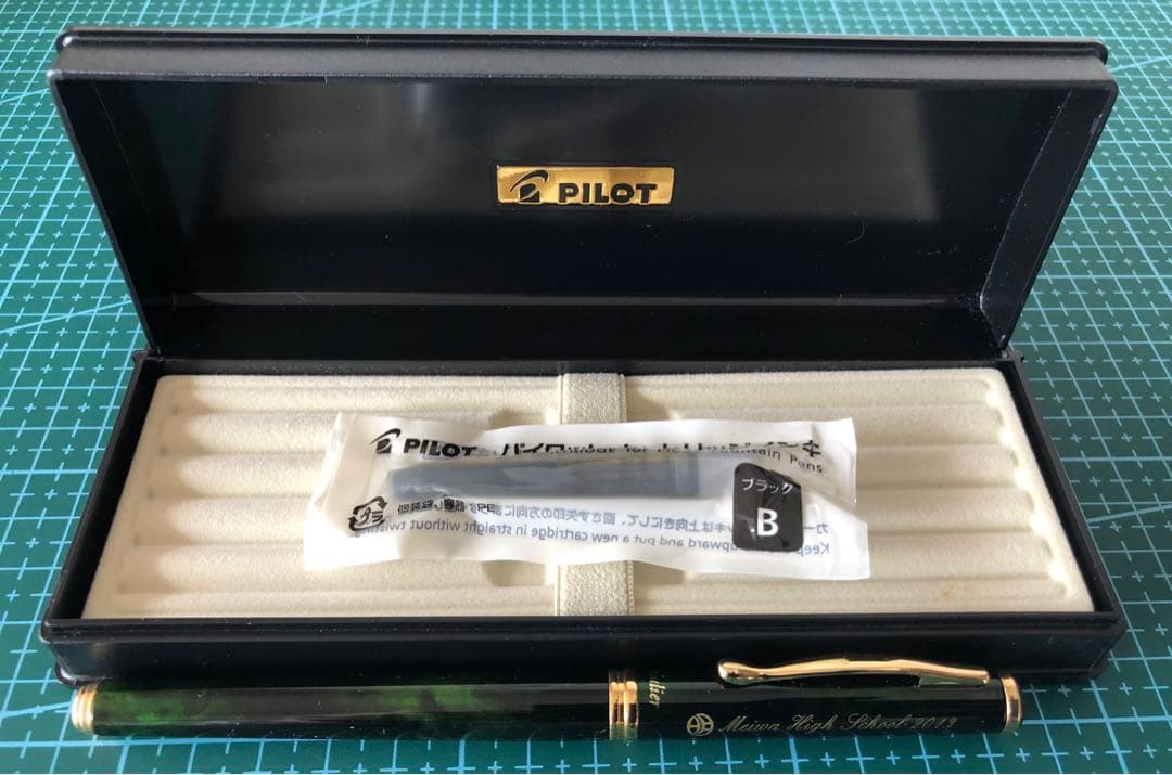 New Pilot Fountain Pen with pen cap, body, and enclosed accessories displayed on white background