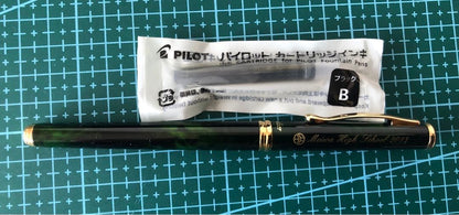 New Pilot Fountain Pen with pen cap, body, and enclosed accessories displayed on white background