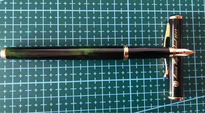 New Pilot Fountain Pen with pen cap, body, and enclosed accessories displayed on white background