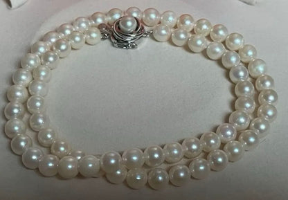 Akoya pearl necklace featuring a 6mm white pearl on a 43cm silver chain with a double lock princess clasp