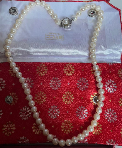 Akoya pearl necklace featuring a 6mm white pearl on a 43cm silver chain with a double lock princess clasp