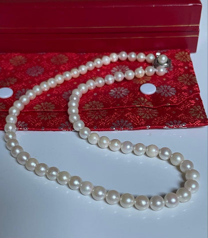 Akoya pearl necklace featuring a 6mm white pearl on a 43cm silver chain with a double lock princess clasp