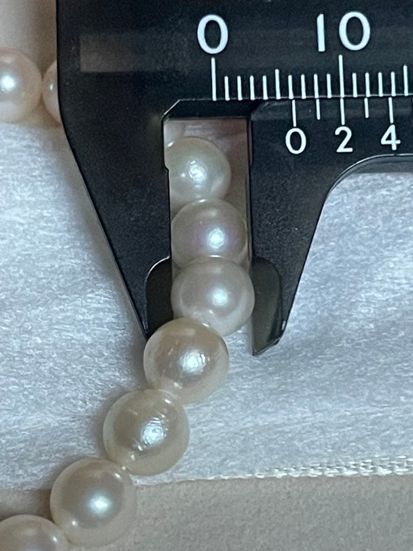 Akoya pearl necklace featuring a 6mm white pearl on a 43cm silver chain with a double lock princess clasp