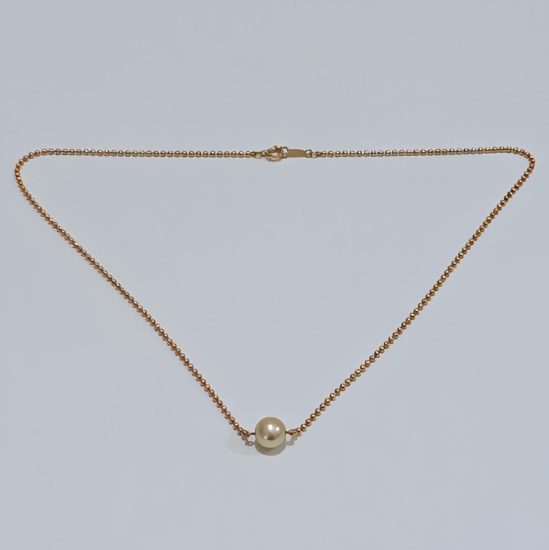 Mikimoto pearl necklace with 6.9mm pearl set in 18K yellow gold pendant on 40cm chain