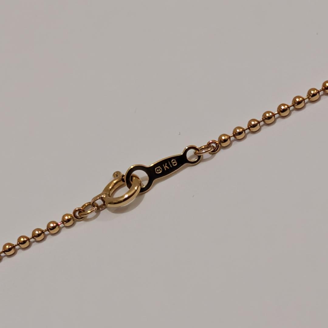 Mikimoto pearl necklace with 6.9mm pearl set in 18K yellow gold pendant on 40cm chain