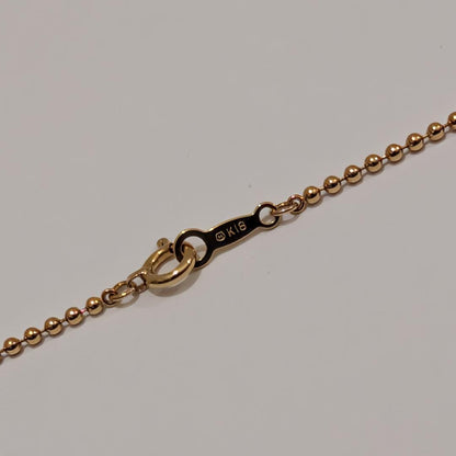 Mikimoto pearl necklace with 6.9mm pearl set in 18K yellow gold pendant on 40cm chain