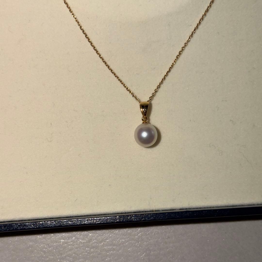 Tasaki single pearl necklace pendant with 8mm rose gold pearl set in 18K gold chain