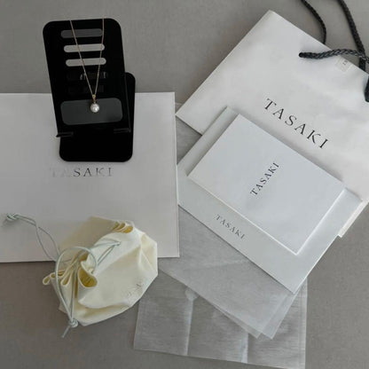 Tasaki single pearl necklace pendant with 8mm rose gold pearl set in 18K gold chain