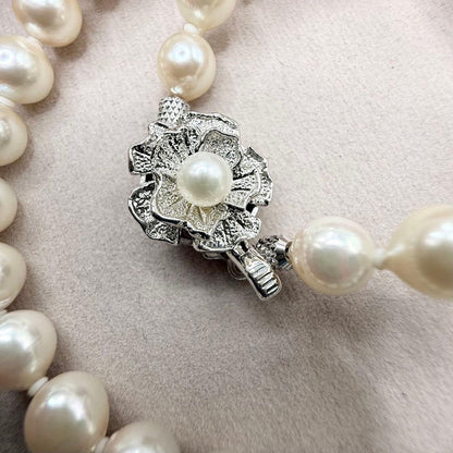 Akoya pearl semi-baroque necklace with 7mm white pearls, approximately 43cm long