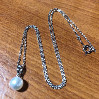 Mikimoto silver necklace featuring a single large 7.3mm pearl on a 40cm chain