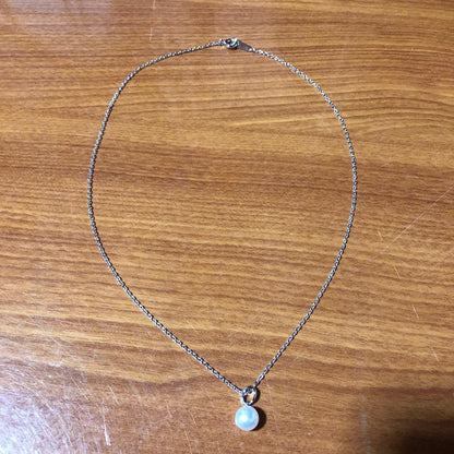Mikimoto silver necklace featuring a single large 7.3mm pearl on a 40cm chain