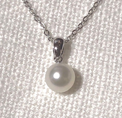 Mikimoto silver necklace featuring a single large 7.3mm pearl on a 40cm chain