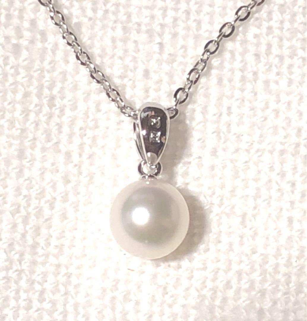 Mikimoto silver necklace featuring a single large 7.3mm pearl on a 40cm chain