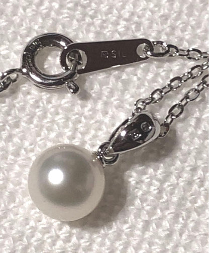Mikimoto silver necklace featuring a single large 7.3mm pearl on a 40cm chain