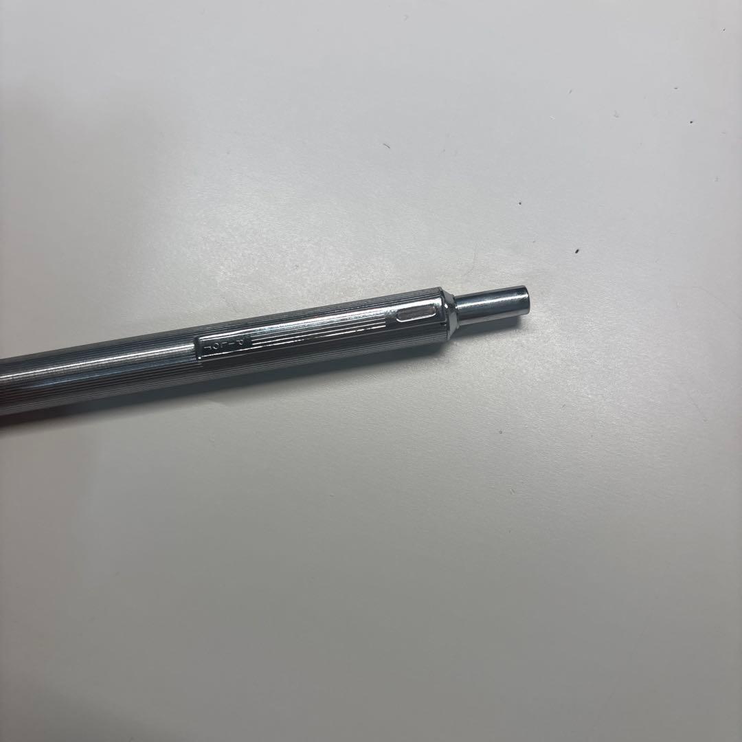 Pilot Stripe 3 Colors Novelty pen in silver metal with click mechanism on white background