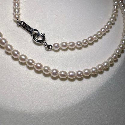 Takashi baby pearl necklace 42cm length with 3.2-3.4mm white pearls on sterling silver chain