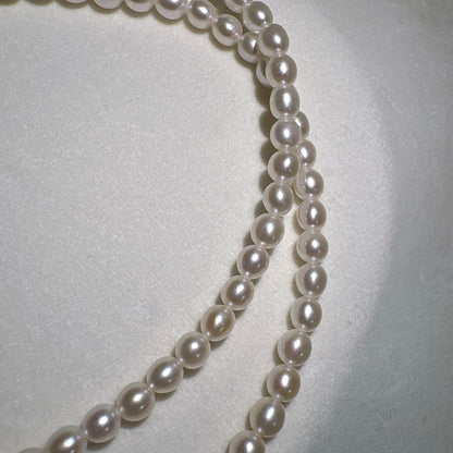 Takashi baby pearl necklace 42cm length with 3.2-3.4mm white pearls on sterling silver chain