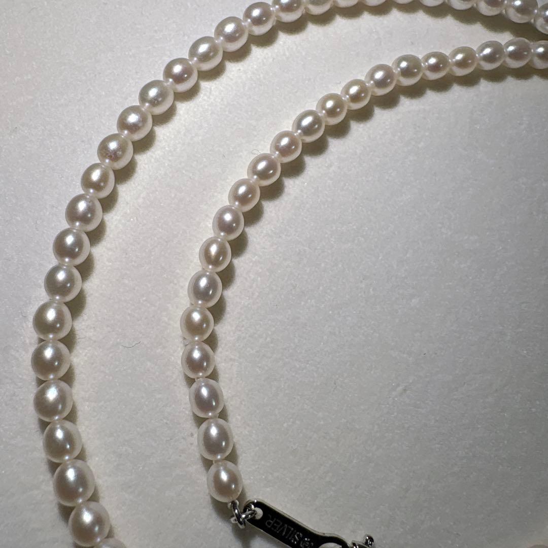 Takashi baby pearl necklace 42cm length with 3.2-3.4mm white pearls on sterling silver chain