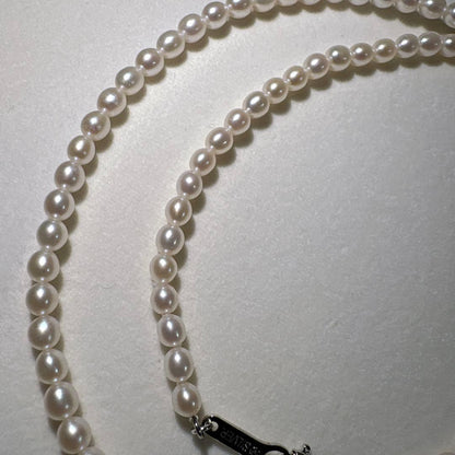 Takashi baby pearl necklace 42cm length with 3.2-3.4mm white pearls on sterling silver chain