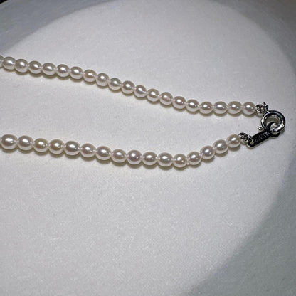 Takashi baby pearl necklace 42cm length with 3.2-3.4mm white pearls on sterling silver chain