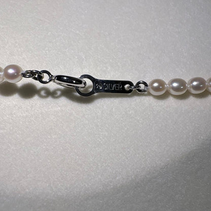 Takashi baby pearl necklace 42cm length with 3.2-3.4mm white pearls on sterling silver chain
