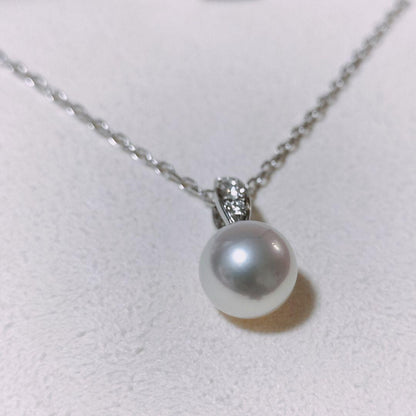 Mikimoto diamond and Akoya pearl necklace in white gold with 7.5mm pearls and clasp marked K18