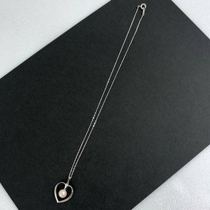 Mikimoto Heart Pearl Necklace featuring a silver engraved heart pendant and a 7mm genuine pearl on a 40cm chain