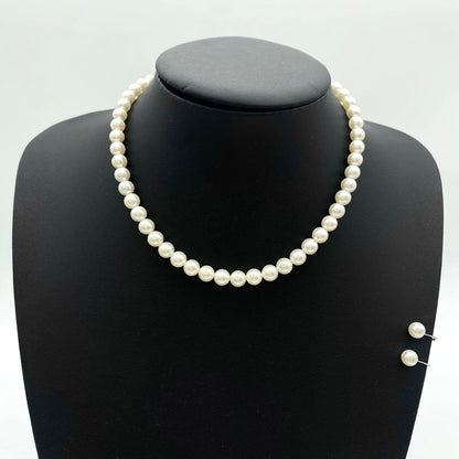 Akoya pearl necklace and matching earrings with 7mm white pearls on a 41cm chain