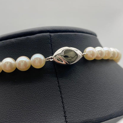 Akoya pearl necklace and matching earrings with 7mm white pearls on a 41cm chain