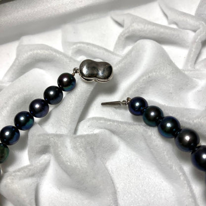 Akoya pearl necklace with 6.9-7.4mm navy round pearls and silver clasp, 42cm length