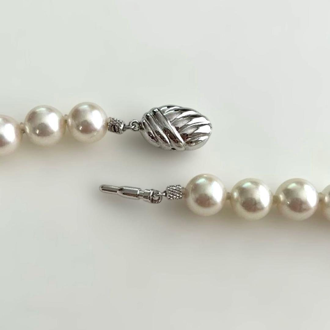 Akoya Pearl Hanadama necklace with 8.5 to 9mm pearls paired with K 14WG and silver earrings set