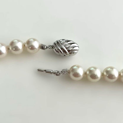 Akoya Pearl Hanadama necklace with 8.5 to 9mm pearls paired with K 14WG and silver earrings set