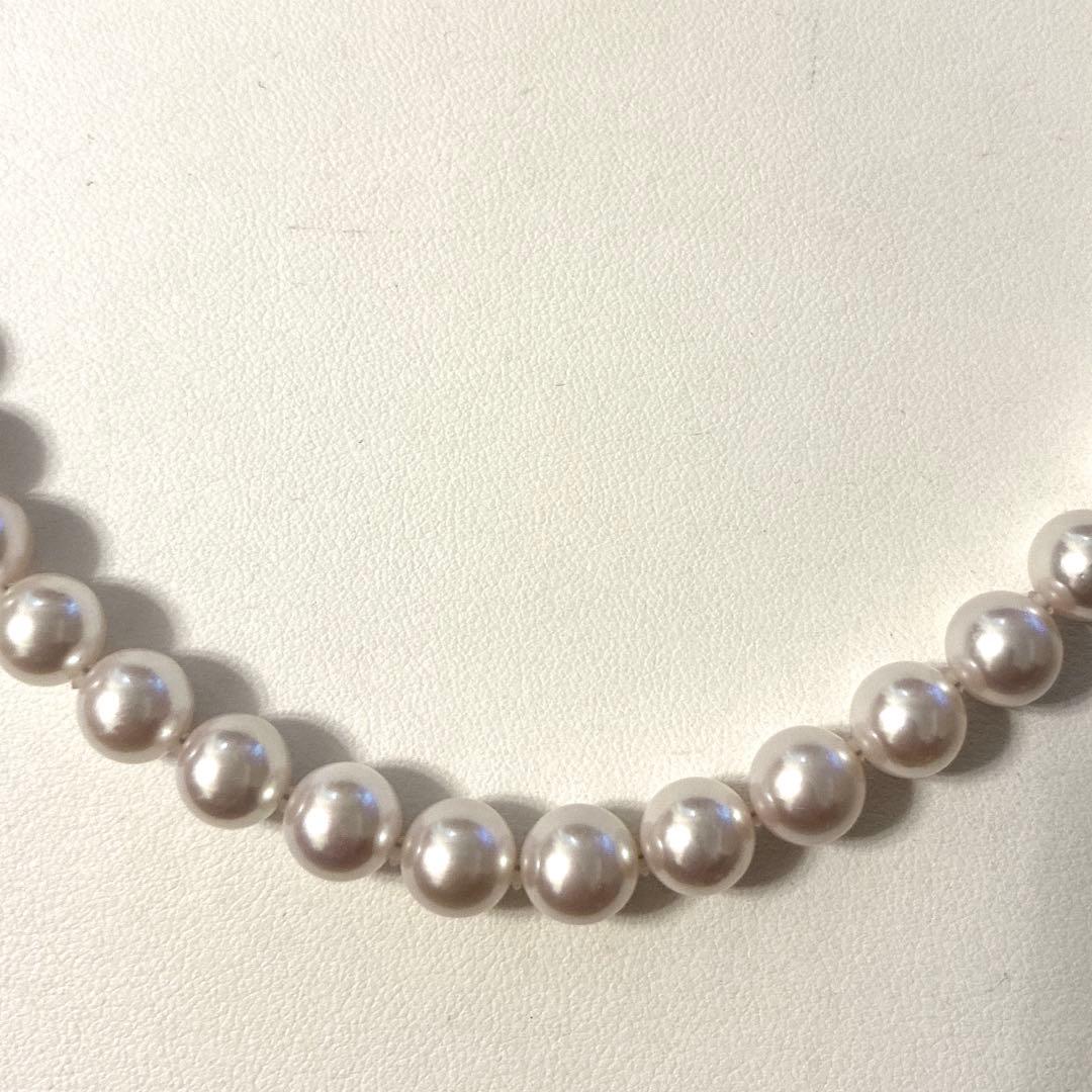 Akoya Pearl Hanadama necklace with 8.5 to 9mm pearls paired with K 14WG and silver earrings set