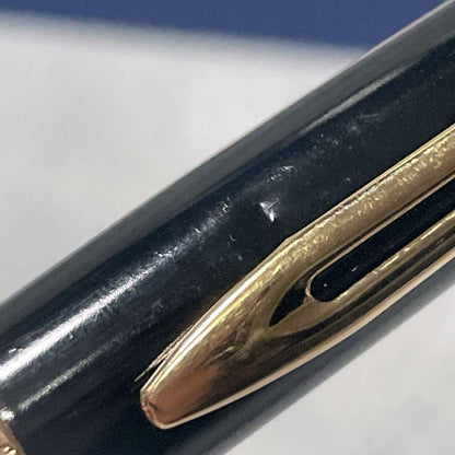 Close-up of a Waterman Fountain Pen with a sleek black body and silver accents